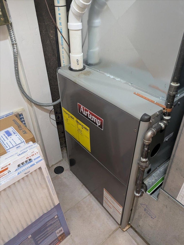 11567 S Lake Blvd, Lake Nebagamon, WI 54849 - utility room featuring heating unit