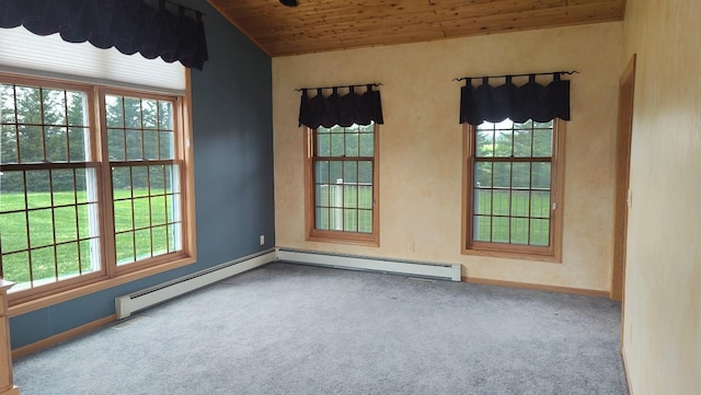 8848 Leander Rd, Angora Twp, MN 55723 - carpeted empty room featuring wooden ceiling, plenty of natural light, vaulted ceiling, and baseboards