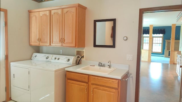 8848 Leander Rd, Angora Twp, MN 55723 - laundry area with cabinet space, separate washer and dryer, and a baseboard radiator