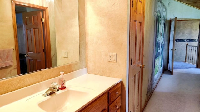 8848 Leander Rd, Angora Twp, MN 55723 - bathroom with vanity and a textured wall