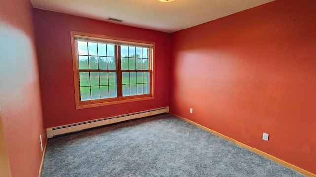8848 Leander Rd, Angora Twp, MN 55723 - empty room with a baseboard radiator, carpet, and baseboards