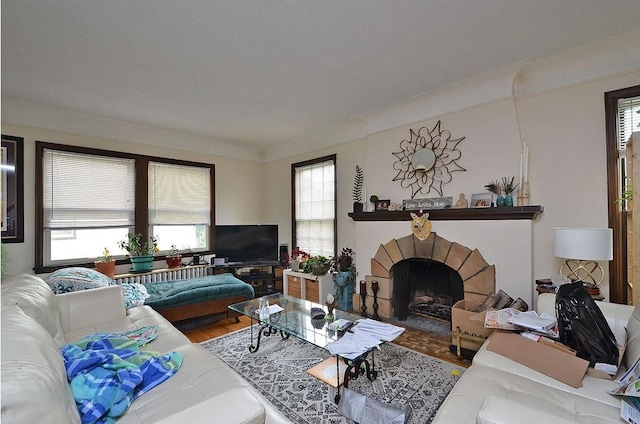 4429 Portland Ave, Minneapolis, MN 55407 - living room with wood finished floors and a fireplace