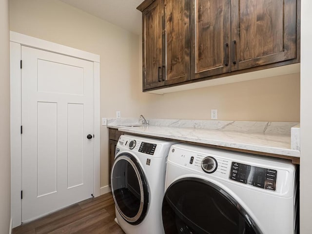 20666 Tamarack St NW, Oak Grove, MN 55011 - laundry room with cabinet space, washing machine and clothes dryer, and dark wood finished floors