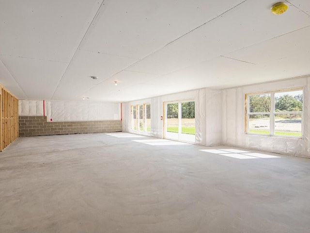 20666 Tamarack St NW, Oak Grove, MN 55011 - empty room with plenty of natural light and concrete floors
