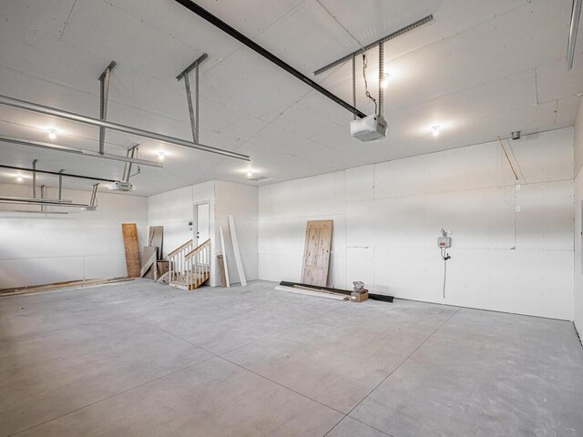 20666 Tamarack St NW, Oak Grove, MN 55011 - garage featuring a garage door opener
