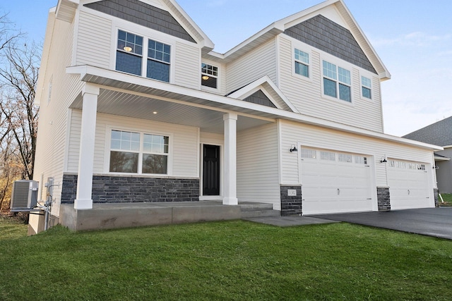 1708 Misty Cir, Buffalo, MN 55313 - craftsman-style house with stone siding, a garage, a front yard, and a porch