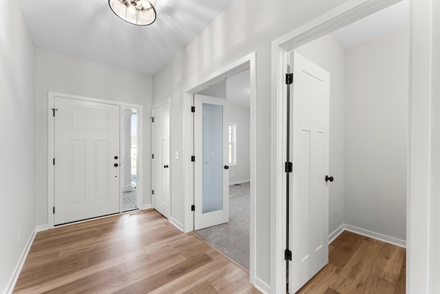 1708 Misty Cir, Buffalo, MN 55313 - entryway with light wood finished floors and baseboards
