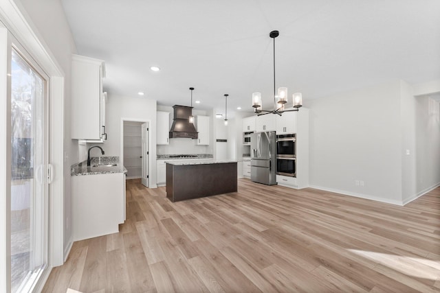 1708 Misty Cir, Buffalo, MN 55313 - kitchen with stainless steel appliances, custom range hood, a chandelier, a center island, and light wood-type flooring