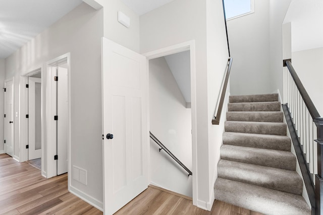 1708 Misty Cir, Buffalo, MN 55313 - staircase with wood finished floors and baseboards