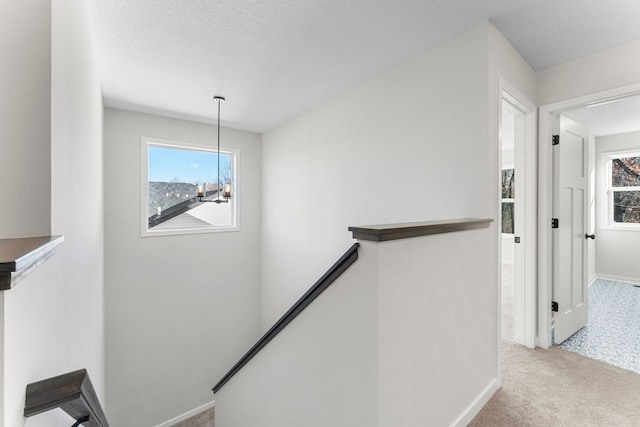 1708 Misty Cir, Buffalo, MN 55313 - hallway featuring an upstairs landing, carpet flooring, and baseboards