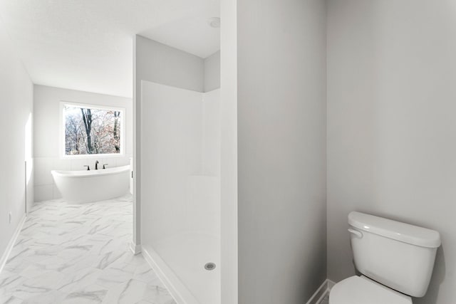 1708 Misty Cir, Buffalo, MN 55313 - full bathroom featuring marble look tiles, toilet, a freestanding tub, and a shower