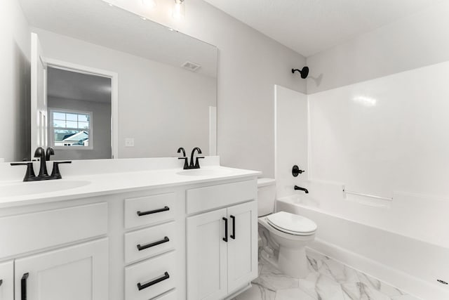 1708 Misty Cir, Buffalo, MN 55313 - bathroom with toilet, washtub / shower combination, double vanity, and marble finish flooring