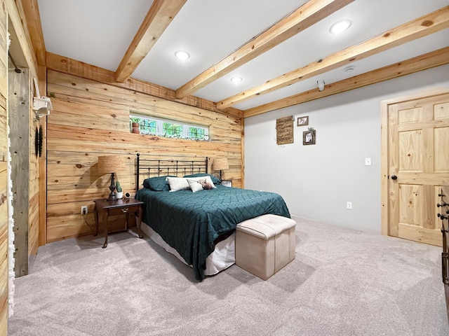7215 Little Dip Ln NE, Bemidji, MN 56601 - carpeted bedroom featuring wooden walls, beam ceiling, and recessed lighting