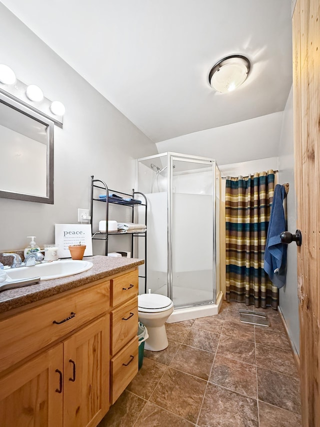 7215 Little Dip Ln NE, Bemidji, MN 56601 - bathroom with vanity, a stall shower, and toilet