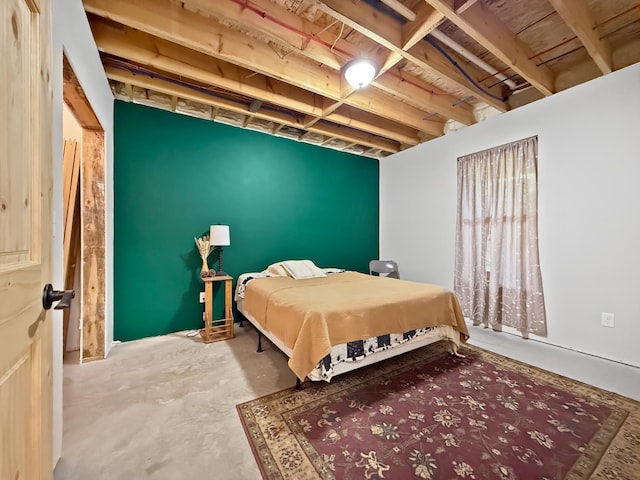 7215 Little Dip Ln NE, Bemidji, MN 56601 - bedroom with unfinished concrete floors