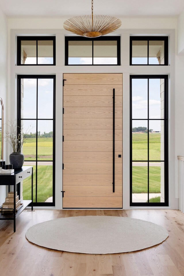 7937 Eldorado Rd, Credit River Twp, MN 55372 - doorway to outside with wood finished floors