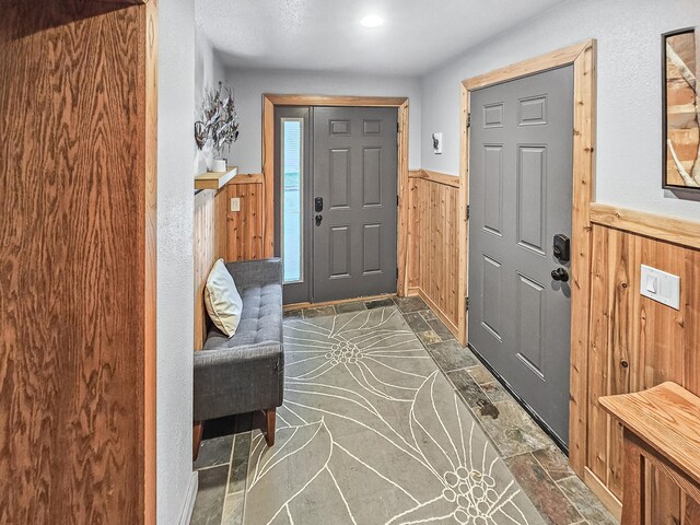 12216 175th St W, Lakeville, MN 55044 - foyer featuring wood walls and wainscoting