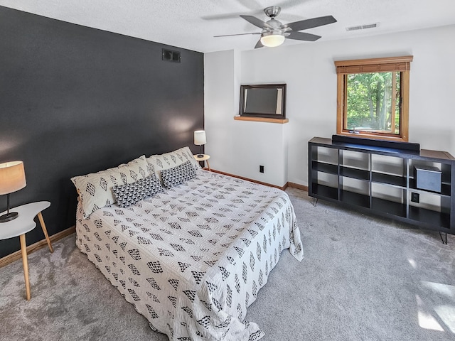 12216 175th St W, Lakeville, MN 55044 - carpeted bedroom featuring baseboards, a textured ceiling, and a ceiling fan