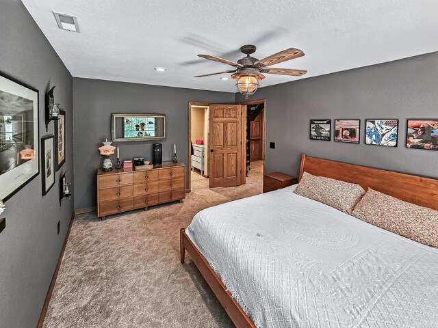 12216 175th St W, Lakeville, MN 55044 - bedroom with carpet, a textured ceiling, ceiling fan, and baseboards