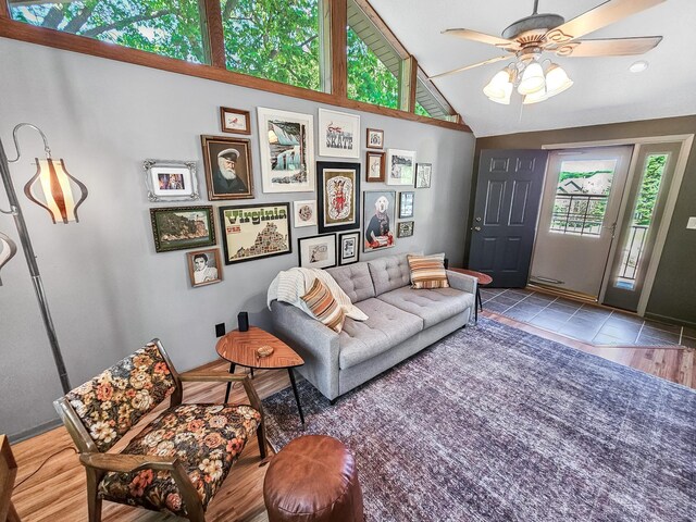 12216 175th St W, Lakeville, MN 55044 - tiled living room featuring ceiling fan and high vaulted ceiling