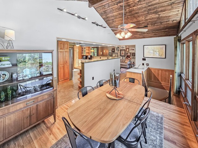 12216 175th St W, Lakeville, MN 55044 - dining space with a ceiling fan, wood ceiling with exposed beams, high vaulted ceiling, and light wood-style flooring
