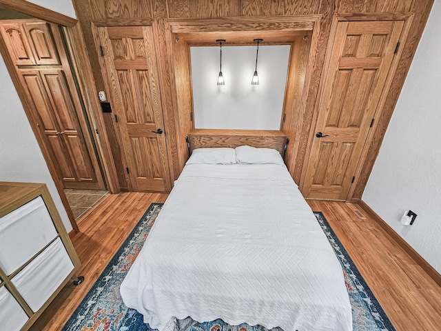 12216 175th St W, Lakeville, MN 55044 - bedroom featuring light wood-style flooring and baseboards