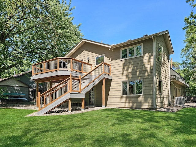 12216 175th St W, Lakeville, MN 55044 - back of property featuring a deck, stairway, and a lawn