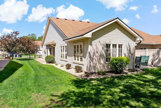 2990 David Cir, Little Canada, MN 55117 - rear view of house featuring a shingled roof and a patio