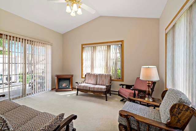 2990 David Cir, Little Canada, MN 55117 - carpeted living area featuring a ceiling fan, plenty of natural light, lofted ceiling, baseboard heating, and baseboards