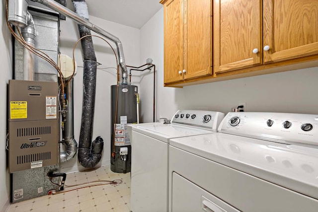2990 David Cir, Little Canada, MN 55117 - washroom with cabinet space, separate washer and dryer, gas water heater, tile patterned floors, and baseboards