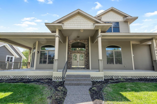 18141 87th Ave N, Maple Grove, MN 55311 - property entrance featuring a porch and stone siding
