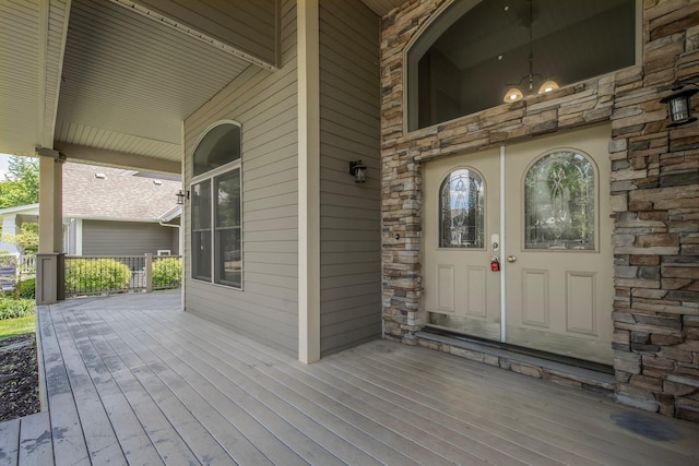 18141 87th Ave N, Maple Grove, MN 55311 - property entrance with covered porch and stone siding