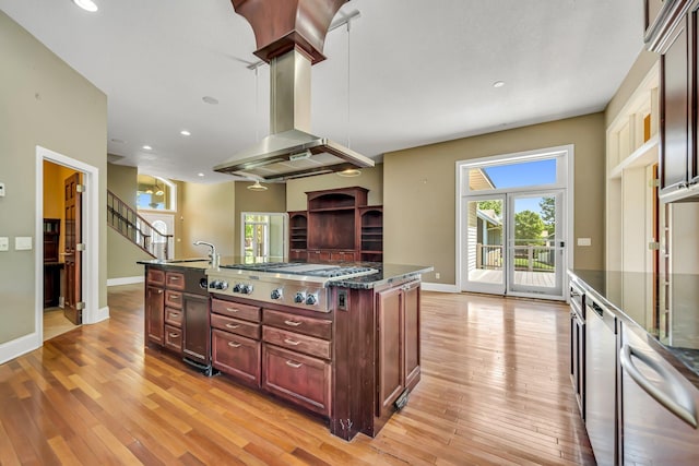 18141 87th Ave N, Maple Grove, MN 55311 - kitchen with appliances with stainless steel finishes, a sink, light wood-type flooring, baseboards, and recessed lighting