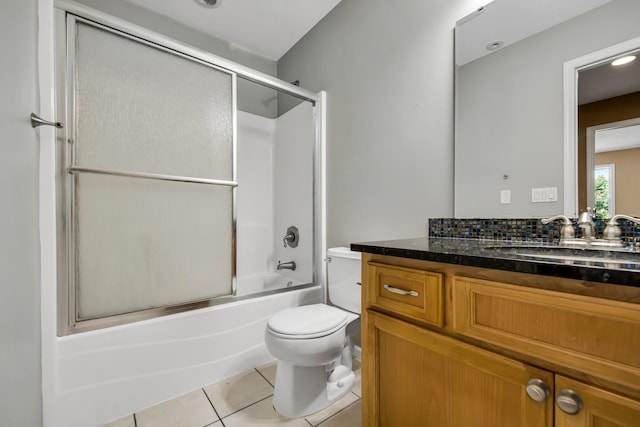 18141 87th Ave N, Maple Grove, MN 55311 - full bathroom featuring vanity, tile patterned floors, toilet, and enclosed tub / shower combo