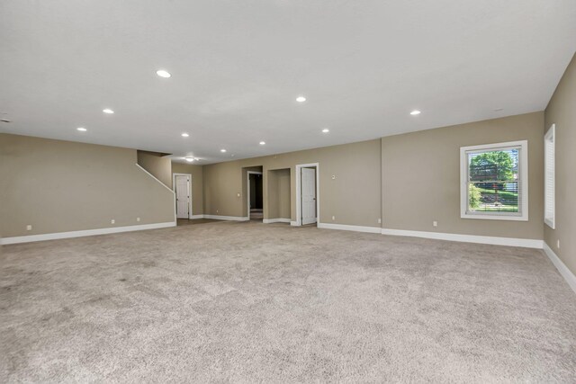 18141 87th Ave N, Maple Grove, MN 55311 - spare room featuring light carpet, recessed lighting, and baseboards