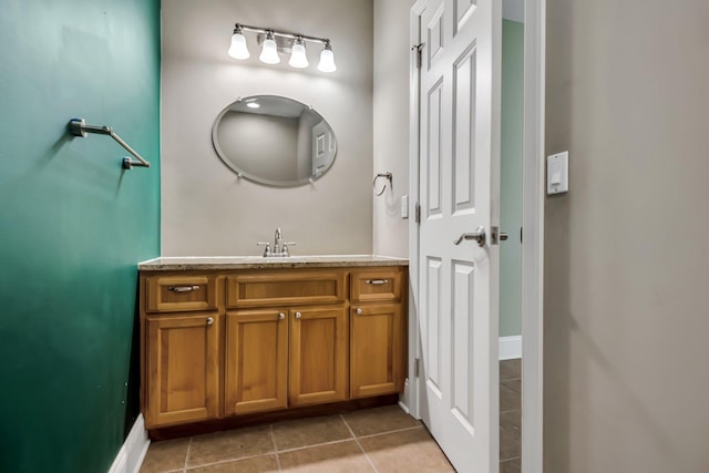 18141 87th Ave N, Maple Grove, MN 55311 - bathroom featuring vanity, tile patterned flooring, and baseboards