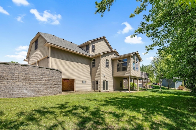 18141 87th Ave N, Maple Grove, MN 55311 - back of house featuring a yard