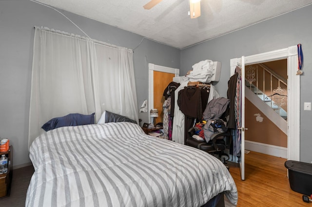 853 York Ave, Saint Paul, MN 55106 - bedroom featuring wood finished floors, baseboards, and ceiling fan