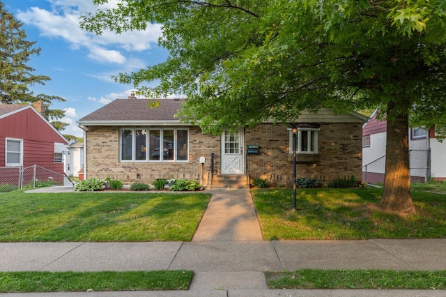 2196 Waukon Ave, Saint Paul, MN 55119 - view of front of home featuring brick siding and roof with shingles