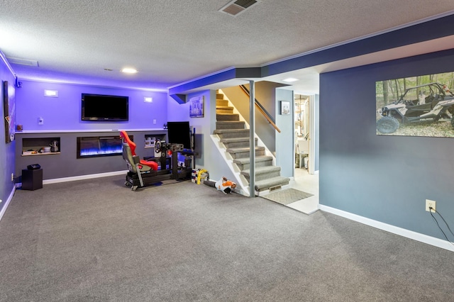 2196 Waukon Ave, Saint Paul, MN 55119 - finished below grade area featuring stairway, a textured ceiling, carpet flooring, and baseboards