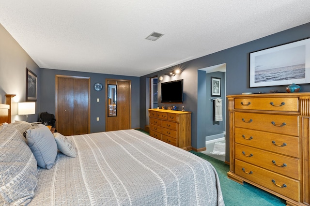 2196 Waukon Ave, Saint Paul, MN 55119 - bedroom featuring carpet, multiple closets, a textured ceiling, and baseboards