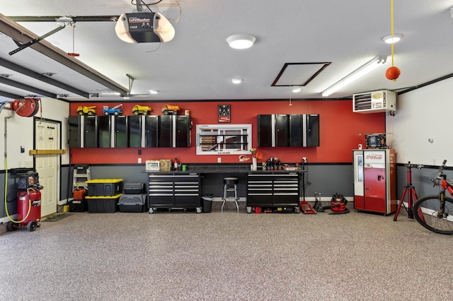 2196 Waukon Ave, Saint Paul, MN 55119 - garage with a garage door opener and a heating unit