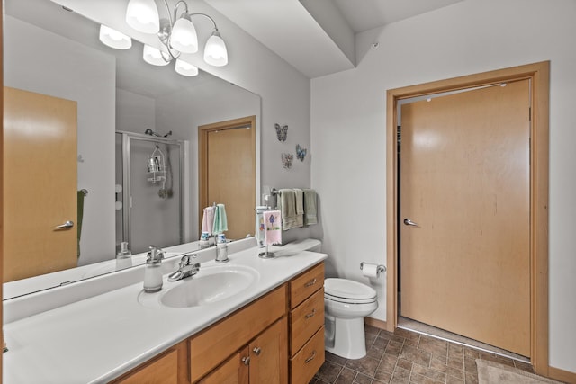 5445 Boone Ave N Unit 216, New Hope, MN 55428 - full bathroom with vanity, a stall shower, toilet, a chandelier, and stone finish floors