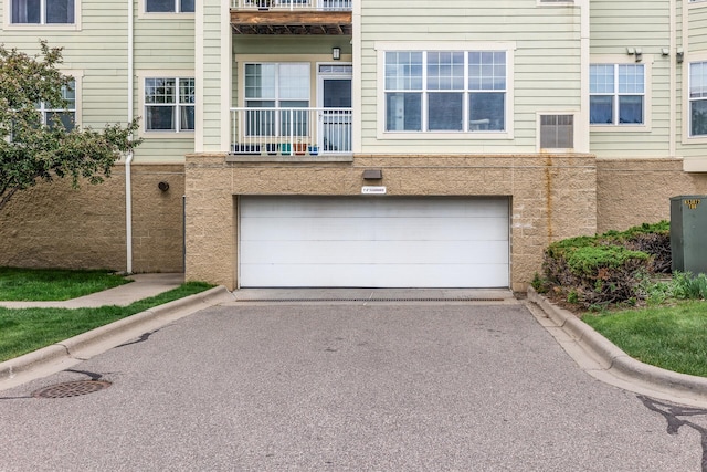 5445 Boone Ave N Unit 216, New Hope, MN 55428 - garage with asphalt driveway