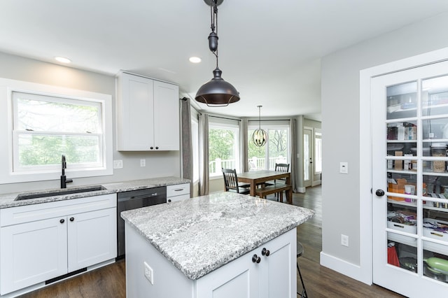 9420 Fabian St NE, Kalmar Twp, MN 55920 - kitchen featuring a sink, a kitchen island, pendant lighting, dark wood finished floors, and recessed lighting