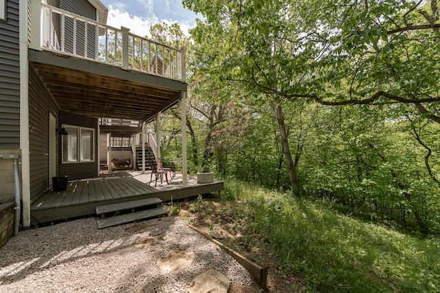 9420 Fabian St NE, Kalmar Twp, MN 55920 - view of yard featuring a wooden deck and stairway