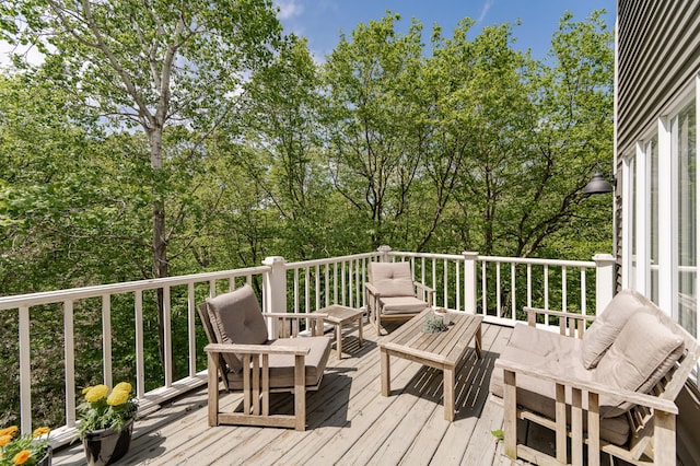 9420 Fabian St NE, Kalmar Twp, MN 55920 - wooden terrace with an outdoor hangout area