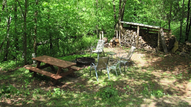 9420 Fabian St NE, Kalmar Twp, MN 55920 - view of yard with a fire pit