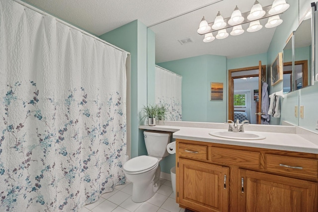 1925 Shenandoah Ct Unit G, Plymouth, MN 55447 - full bathroom featuring toilet, vanity, tile patterned flooring, and curtained shower