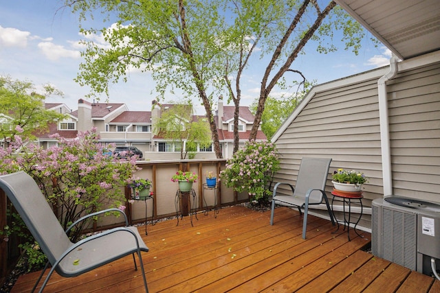 1925 Shenandoah Ct Unit G, Plymouth, MN 55447 - wooden terrace featuring central air condition unit and a residential view